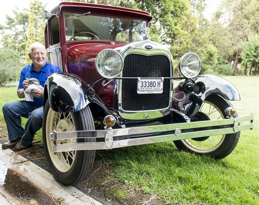 Gary Armidale Next To His Car